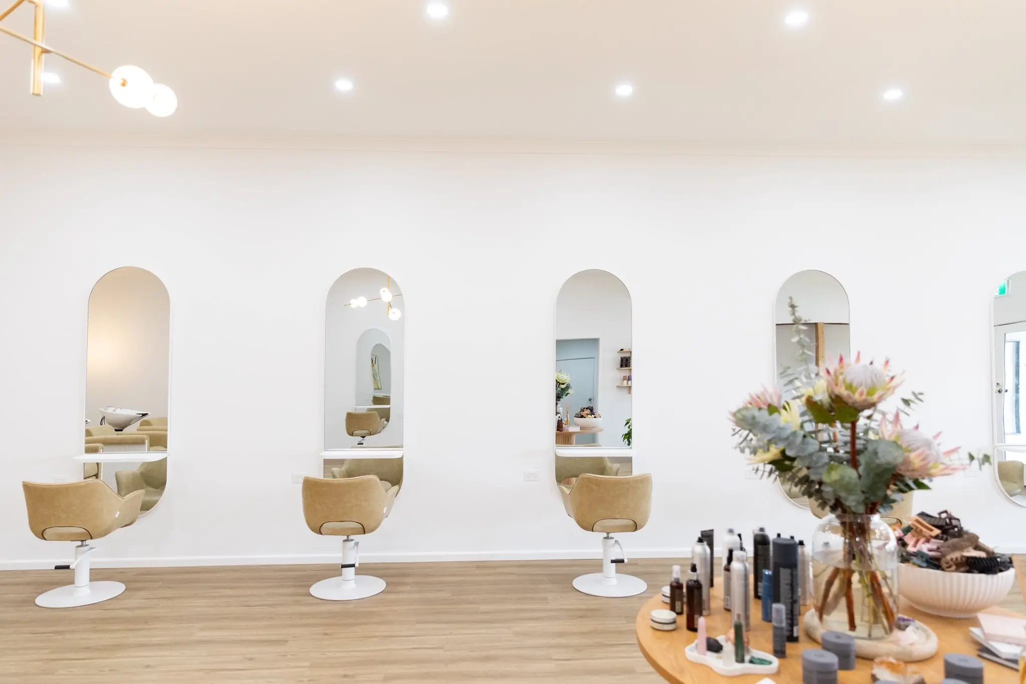 Bespoke styling stations and leather chairs at Ergo and Mane organic hair salon, 35 minutes from Bendigo
